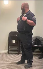  ?? ?? Officer Ryan Moore requests to become a Geneva employee as a firearms training instrctor