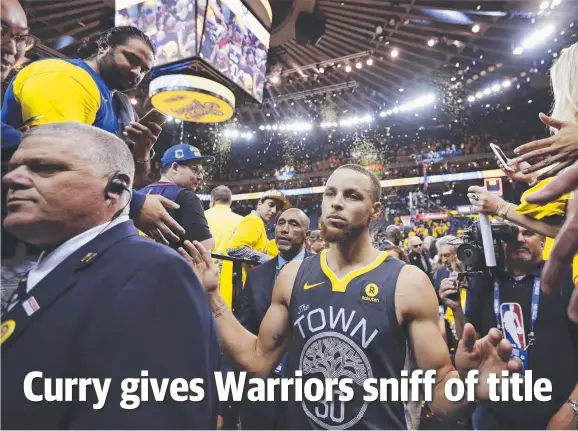  ?? Picture: PA ?? THE MAN: Fans swamp Stephen Curry after the Golden State Warriors guard’s series defining performanc­e against the Cleveland Cavaliers.