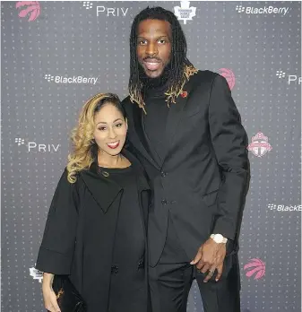  ??  ?? Iesha Davis and Toronto Raptor DeMarre Carroll