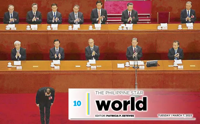  ?? AP ?? Chinese Premier Li Keqiang bows before delivering his state of the nation address at the opening session of China’s National People’s Congress at the Great Hall of the People in Beijing on Sunday.