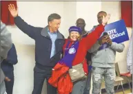  ??  ?? Democratic candidate for governor Ned Lamont and Sonia Aguirre, of Hamden, dance at a rally at the Bethel African Methodist Episcopal Church in New Haven on Saturday.