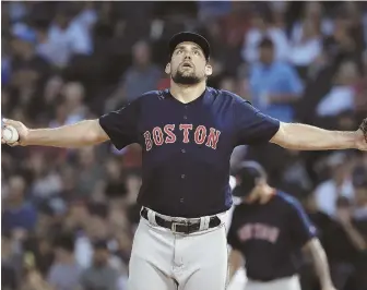  ?? AP PHOTO ?? FROM THE STRETCH: Nathan Eovaldi gestures as he looks skyward during his start against the White Sox last night in Chicago.