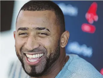 ?? STAFF PHOTO BY MATT STONE ?? HE’S BACK: Infielder Eduardo Nunez is all smiles in Fort Myers yesterday after officially returning to the Red Sox.