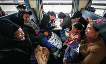  ?? ZHANG JIANMIN / FOR CHINA DAILY ?? Train No 5633/4 passes through Xide and Yuexi counties in the Wumeng Mountain in Guizhou. Local students take this slow train to school.