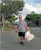  ??  ?? Keith Earl can be seen picking up rubbish in Kerikeri every morning.