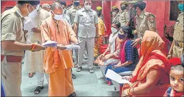  ?? PTI ?? Chief minister Yogi Adityanath during 'Janta Darshan' programme in Gorakhpur on Thursday.