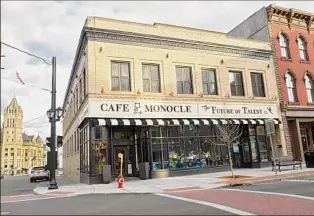  ?? Lori Van Buren / Times Union archive ?? Cafe Monocle, at 95 Remsen St. in Cohoes, is seen before its sign and logo were removed.