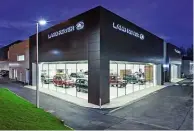  ??  ?? Distinctiv­e glassfront­ed design is set to become a trademark for JLR dealers, with light woods inside as well as classy bathrooms for customers