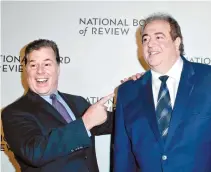  ?? EPA-Yonhap ?? “Green Book” co-screenwrit­ers Brian Currie, right, and Nick Vallelonga arrive for the National Board Of Review Gala at Cipriani 42nd street in New York, Jan. 8. According to media reports, Vallelonga, who won the Golden Globe for best screenplay for the movie “Green Book,” has deleted his Twitter account after an anti-Muslim 9/11 tweet from November 2015 resurfaced.