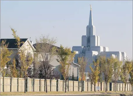  ?? Colleen De Neve/calgary Herald ?? The new Church of Jesus Christ of Latter-Day Saints in the Rocky Ridge Ranch area. It is one of only 140 other Mormon temples across the globe.