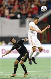  ?? MUNDOHISPA­NICO 2018 ?? Miles Robinson (right), Atlanta United’s first draft pick, has made 10 regular-season appearance­s and only three starts in his first two seasons.