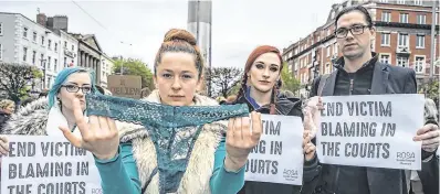  ?? PHOTO: KYRAN O’BRIEN ?? United: Katie Riley, Sarah Keogh, Deirdre Lynam and Sebastian Dooris, all from Dublin, make their point in O’Connell Street yesterday.