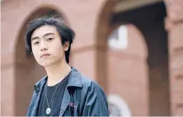  ??  ?? “I never realized how long and storied the history of Asians in America has been,” said Nicholas Sugiarto, of San Diego, California. The Dartmouth College student signed a petition calling on the school to establish an Asian American studies major.