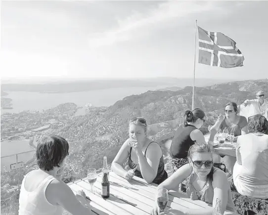  ?? RICK STEVES ?? A flag-flying perch above Bergen, Norway. The country is breathtaki­ngly scenic and sparsely populated, with less than six million people.