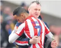  ??  ?? BONDING Tom Ince and Stoke manager Michael O’neill