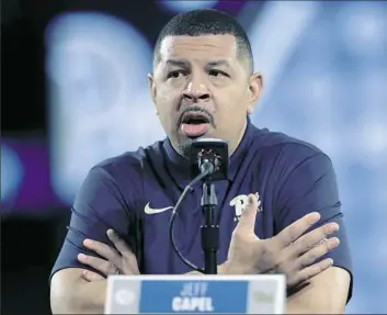  ?? Associated Press ?? THE NEW GUY Jeff Capel took part in his first ACC men’s basketball media day as Pitt’s head coach Wednesday in Charlotte, N.C. Pitt is Capel’s third Division I head coaching job.