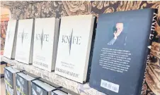  ?? — AFP photo ?? Rushdie’s new book ‘Knife’ is pictured in a bookstore in Los Angeles, California British-American author Salman Rushdie releases his memoir ‘Knife’ on recounting the harrowing experience of being stabbed at a public event in 2022 and how he overcame the near-fatal ordeal.