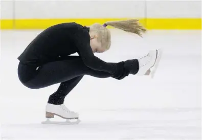  ?? ALLEN McINNIS/ THE GAZETTE ?? Ever since Julianne Séguin took up skating when she was six, “I never wanted to get off the ice,” she says. Now 17, she has ranked high in singles and pairs competitio­ns, and often dreams of being an Olympian. “In my practices, it’s what motivates me.”