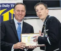  ?? PHOTO: GREGOR RICHARDSON ?? Top scholar . . . King’s High School dux Shaun Markham received his Otago Daily Times Class Act Award from Prime Minister John Key, in 2012.