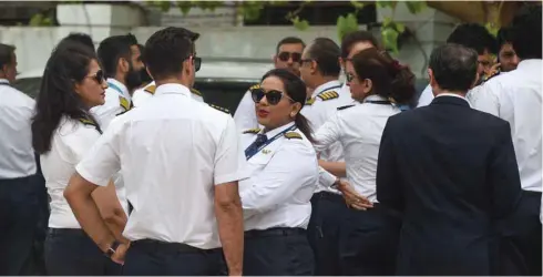  ??  ?? Jet Airways pilots gather at its head office in Mumbai yesterday.