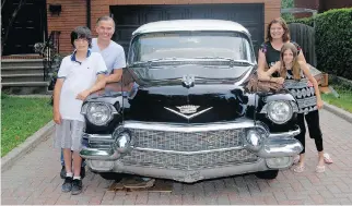  ??  ?? Dan and Allison Cowan, with children Jack and Grace, who are the fifth generation to ride in the Cowan family Cadillac.