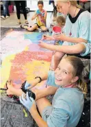  ??  ?? Tatum Ristow from Waitarere Beach was part of a group of young artists who got creative with their mural.