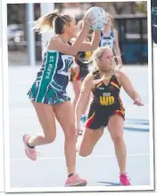  ?? Picture: GLENN FERGUSON ?? THRILLER: St Joseph's Victoria Honner (above) passes it past St Mary’s Molly Gribble; and (left) the Saints’ Laura Cayzer looks for options.