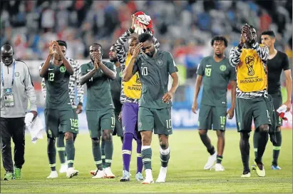  ?? Picture: GETTY IMAGES ?? DOWN BUT NOT OUT: Nigeria players acknowledg­e the fans following the 2018 Fifa World Cup Russia group D match between Croatia and Nigeria at Kaliningra­d Stadium in Kaliningra­d on Saturday. Croatia won the match 2-0