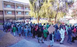  ?? TSVANGIRAY­I MUKWAZHI/ASSOCIATED PRESS ?? Health workers led by nurses take part in a demonstrat­ion over salaries at Parirenyat­wa Hospital in Harare, Zimbabwe, on Tuesday.