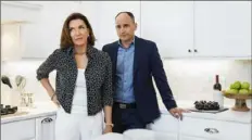  ?? Catherine Nguyen/HGTV ?? Interior designer Hilary Farr and real estate agent David Visentin co-star on HGTV’s “Love It or List It.”