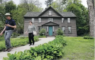  ??  ?? Visitors depart Orchard House in Concord, Mass., where Alcott wrote Little Women.