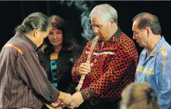  ?? JANA CHYTILOVA / Ottawa Citizen ?? Commission­ers Marie Wilson, Justice Murray Sinclair and Chief Wilton Littlechil­d participat­e in the Presentati­on of the Pipe during a ceremony to mark their leadership of the Indian
Residentia­l Schools Truth and Reconcilia­tion Commission in 2009.