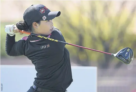  ??  ?? Thailand’s Moriya Jutanugarn hits a shot in the first round.