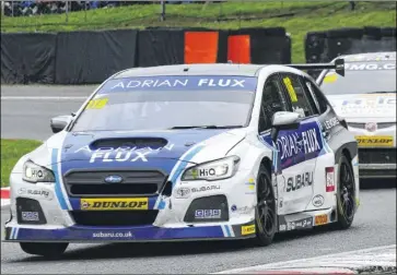  ?? Picture: Simon Hildrew ?? Ashley Sutton at the wheel of his Subaru Levorg