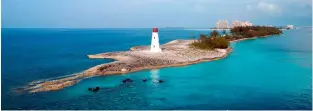 ??  ?? Paradise Island and its lighthouse in the Bahamas