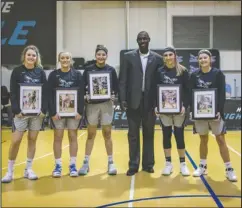  ?? Submitted photo ?? SOPHOMORE NIGHT: National Park College head women’s basketball coach Marvin Moody, third from right, recognized sophomores, from left, Bailey Womack, Hailee Crosby, Kayla Sims, Faith Bratton and Laney Wallace Wednesday before their final home game. Photo by Aaron Brewer, courtesy of National Park College.