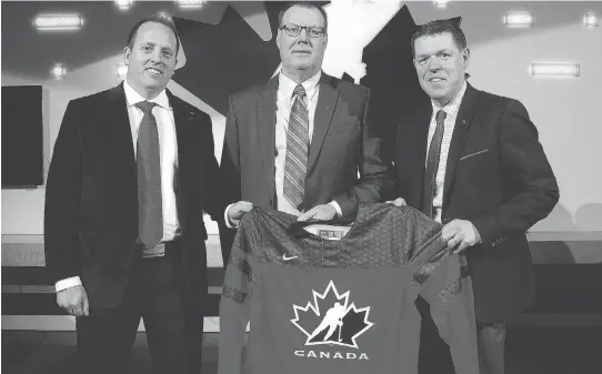  ?? DEAN PILLING ?? Hockey Canada senior manager Shawn Bullock, head scout Brad McEwen and president Scott Smith announce the players invited to the junior team camp on Wednesday.