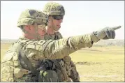  ?? SGT. 1ST CLASS R.W. LEMMONS IV / U.S. ARMY ?? U.S. Army Lt. Col. Ed Matthaides­s (left) delineates an Iraqi security forces tactical assembly area for U.S. Army Maj. Gen. Gary J. Volesky in northern Iraq before the start of the Mosul offensive.