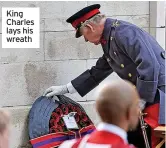  ?? ?? King Charles lays his wreath