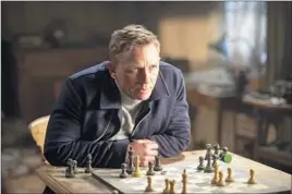  ?? Susie Allnutt
Columbia Pictures ?? DANIEL CRAIG is back as James Bond, trailing a shady group in “Spectre.”