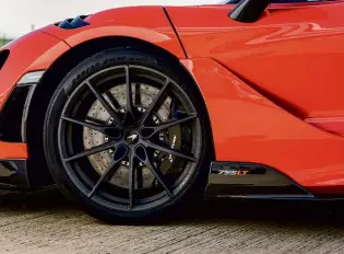  ??  ?? Left: bespoke Trofeo R rubber offers up immense grip; brake calipers are from the Senna, while a racing-derived braking set-up is optional. Right: paredback cabin features optional bucket seats also borrowed from the Senna