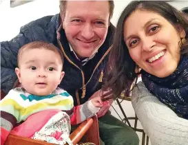  ?? (AFP) ?? This file photo shows Nazanin Zaghari-Ratcliffe with her husband Richard and daughter Gabriella