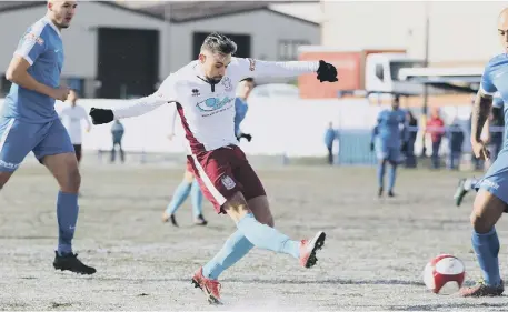  ??  ?? South Shields’ Jamie Holmes gets in a shot at Glossop North End in Saturday’s 3-1 Evo-Stik League North win. Pictures by Peter Talbot,