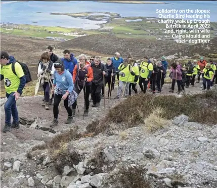  ?? ?? Solidarity on the slopes: Charlie Bird leading his charity walk up Croagh Patrick in April 2022 and, right, with wife Claire Mould and their dog Tiger