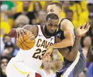  ?? Marcio Jose Sanchez / Associated Press ?? In this June 3, 2018, file photo, Cleveland Cavaliers forward LeBron James (23) drives against Golden State Warriors guard Stephen Curry during Game 2 of the NBA Finals in Oakland, Calif. James is signing as a free agent with the Los Angeles Lakers, leaving the Cavaliers for the second time to join one of the NBA’s most iconic franchises. James made the announceme­nt Sunday on a release, saying he has agreed to a four-year, $154 million contract.