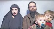  ?? [AP PHOTO] ?? In this image from video released by Taliban Media in December 2016, Caitlan Coleman talks in the video while her Canadian husband Joshua Boyle holds their two children.