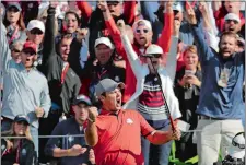  ?? CHARLIE RIEDEL/AP PHOTO ?? Patrick Reed, who teamed with Jordan Spieth, reacts after making a putt to clinch a 3 &amp; 2 win over Europe’s Justin Rose and Henrik Stenson during Friday morning’s foursomes match at the Ryder Cup in Chaska, Minn. Rose and Stenson came back to beat Reed and Spieth in the afternoon match, but the U.S. holds a 5-3 lead.