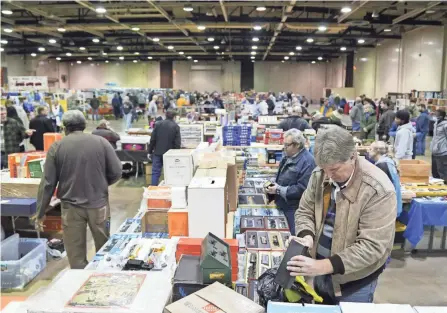 ?? ?? People browse vendors during the Great Train Show at the Ohio Expo Center on Saturday.