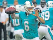  ??  ?? Dolphins quarterbac­k Jay Cutler played the first two series Thursday in Miami’s 31-7 loss to the Ravens in Miami Gardens, Fla.