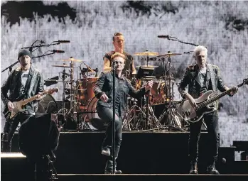  ?? AFP/GETTY IMAGES ?? U2 delivered a spirituall­y uplifting May 12 performanc­e that had people on the edge of their seats singing along. The band performed their Joshua Tree album as if it was still fresh to them.